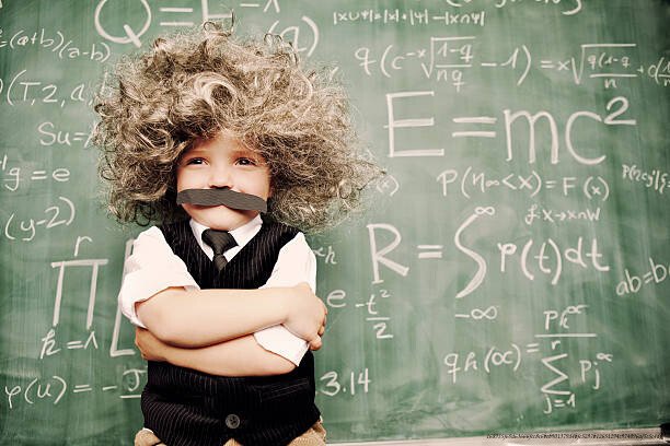 LA DÉCOUVERTE DE L'APPRENTISSAGE CHEZ LES ENFANTS : CE QUE LA SCIENCE NOUS APPREND SUR LE CERVEAU DES TOUT-PETITS 3 A young math whiz smiles as he has solved the riddles of the universe.